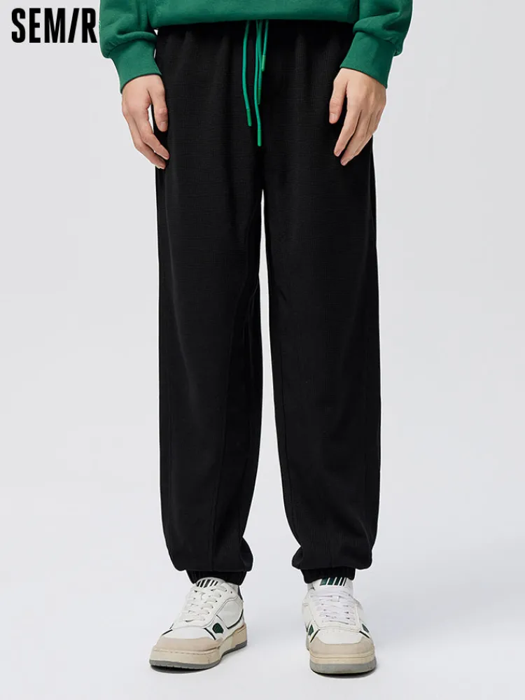 mens_draping_waffle_contr_0.webp SEMIR Men's Draping Waffle Contrast Ribbon Loose Knitted Jogging Pants