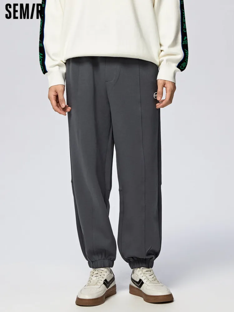 mens_ut_interlock_d_badge_0.webp SEMIR Men's UT Interlock 3D Badge Loose Knitted Jogging Pants