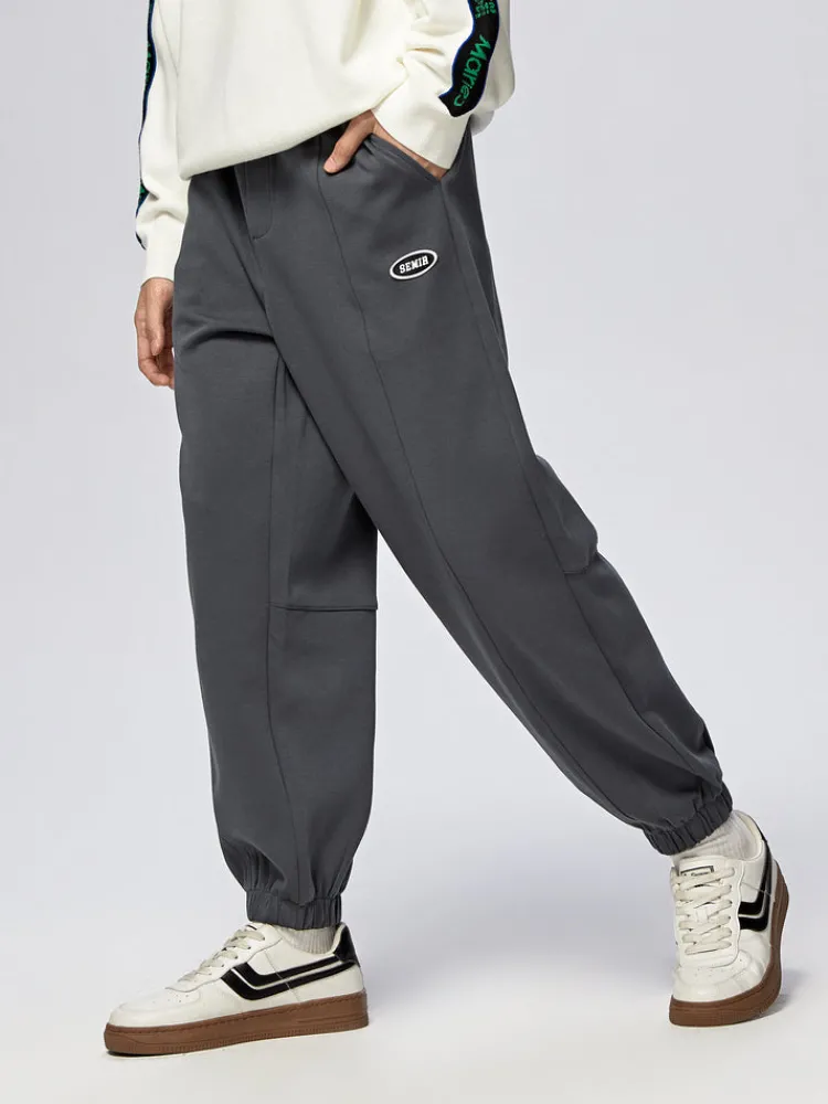mens_ut_interlock_d_badge_1.webp SEMIR Men's UT Interlock 3D Badge Loose Knitted Jogging Pants